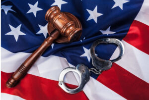 Gavel, handcuffs and american flag 